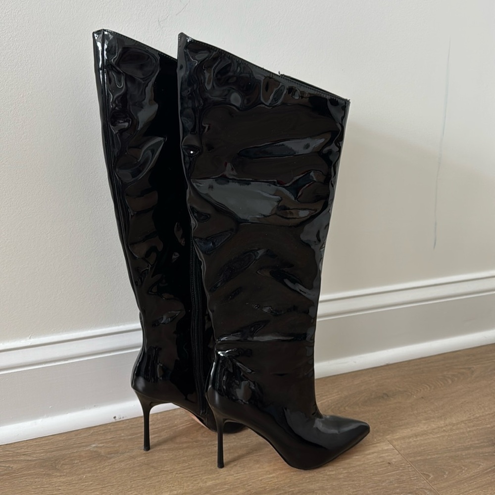 Knee high stiletto boots